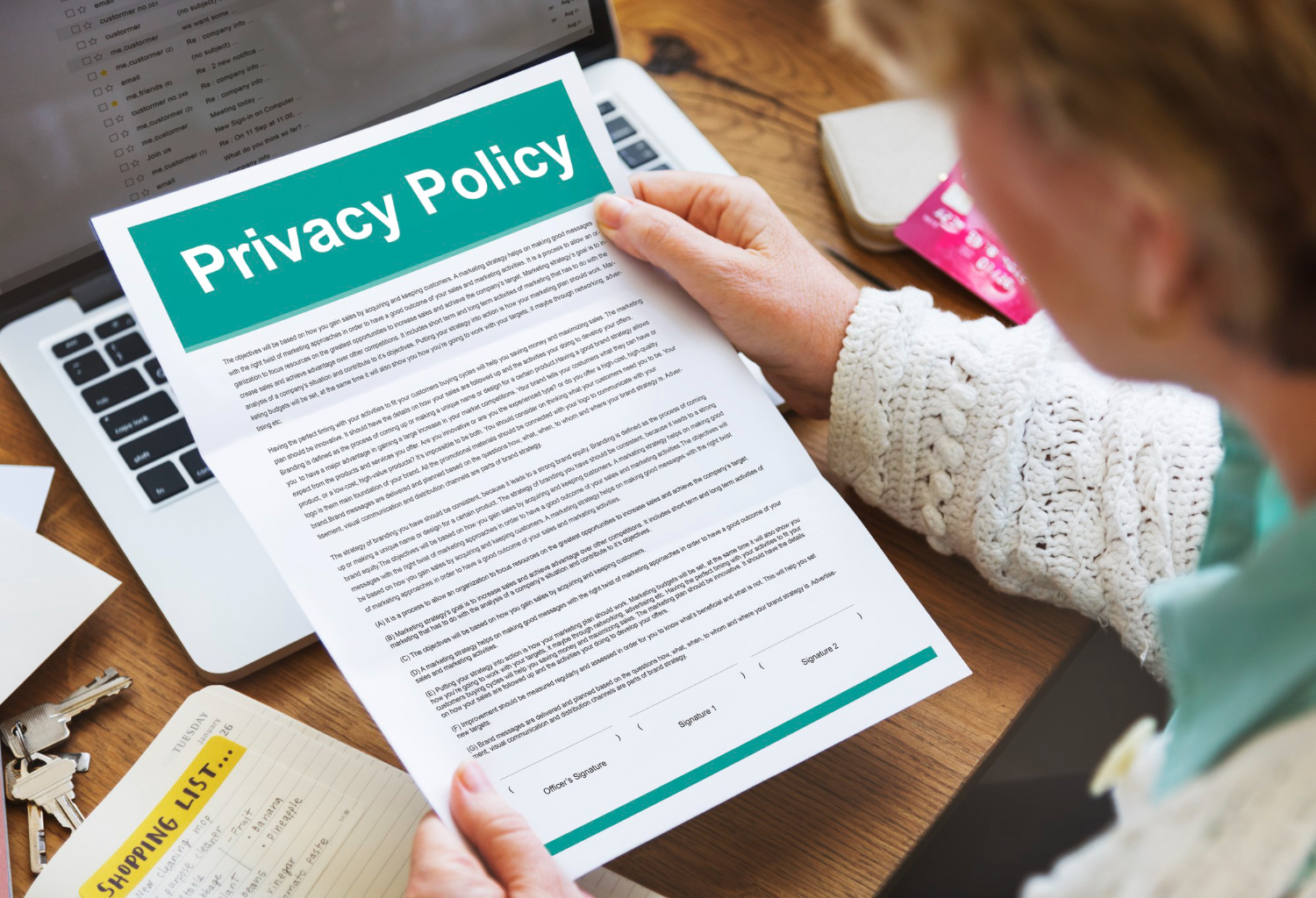 Woman reading privacy policy document during analytics migration